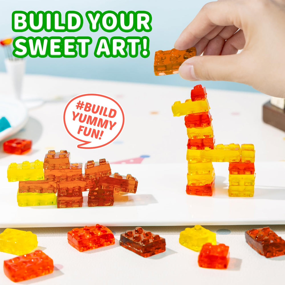 Kids build tasty towers with AMOS 4D blocks before enjoying a chewy fruit bite.