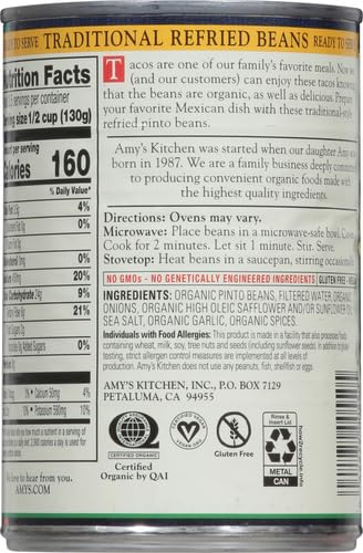 Amy's Organic Refried Beans ingredients display with organic pinto beans and aromatics.