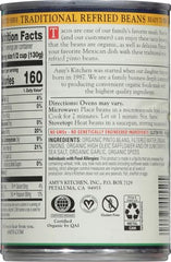 Amy's Organic Refried Beans ingredients display with organic pinto beans and aromatics.