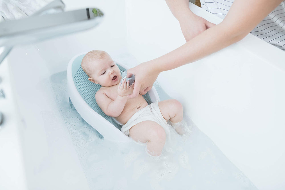 Angelcare Bath Support Aqua hanging loop enables convenient storage.