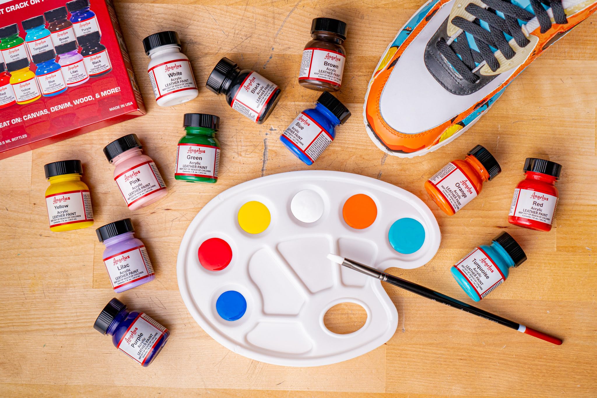Angelus airbrush-ready option demonstrated for smooth gradients and professional finishes.