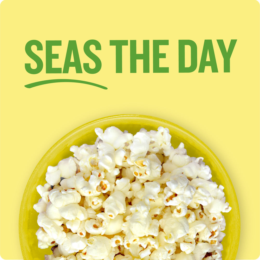 Angie's Sea Salt Popcorn on a road trip snack spread.