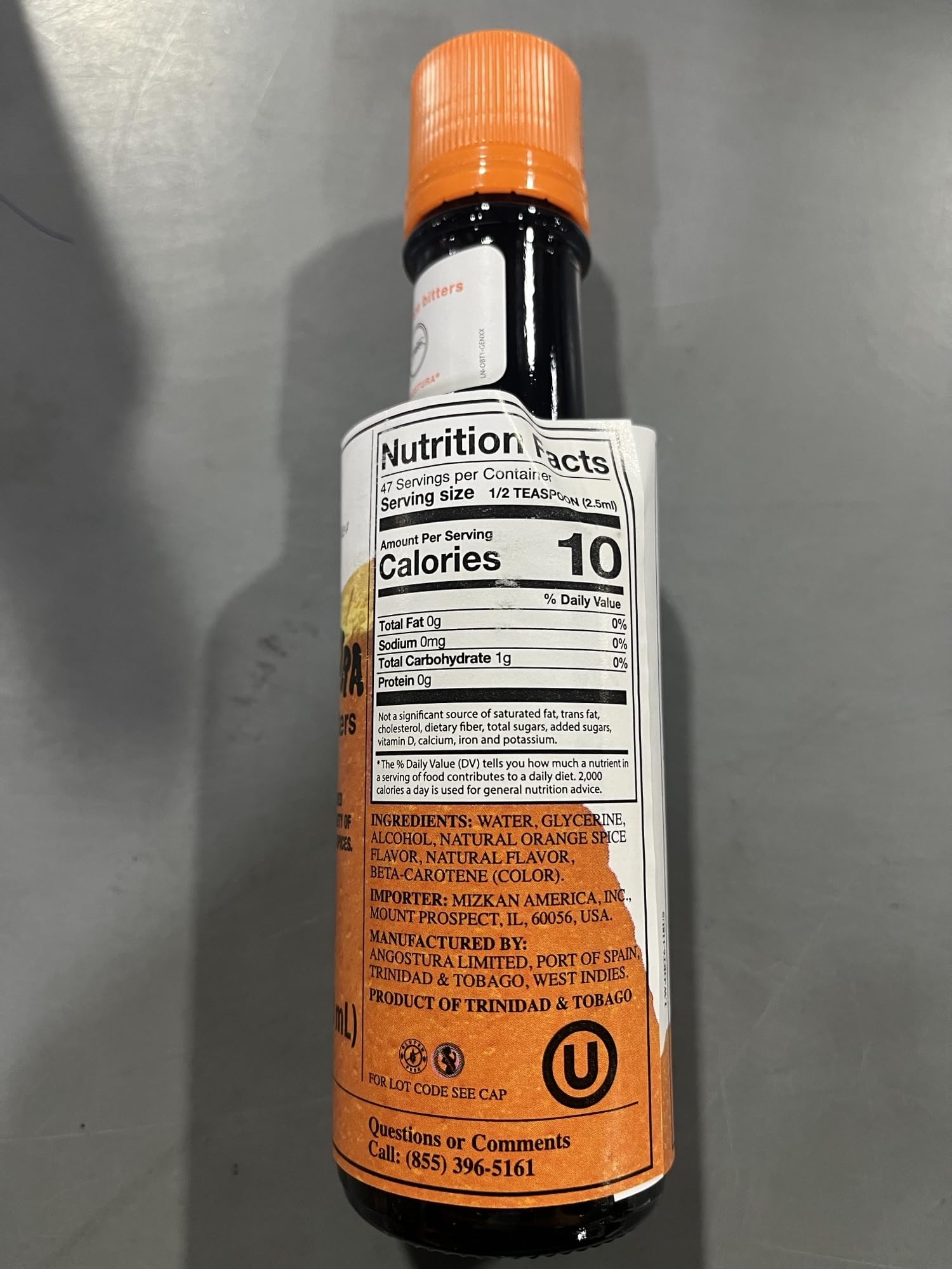 ANGOSTURA Aromatic Bitters label close-up emphasizes heritage and aroma.