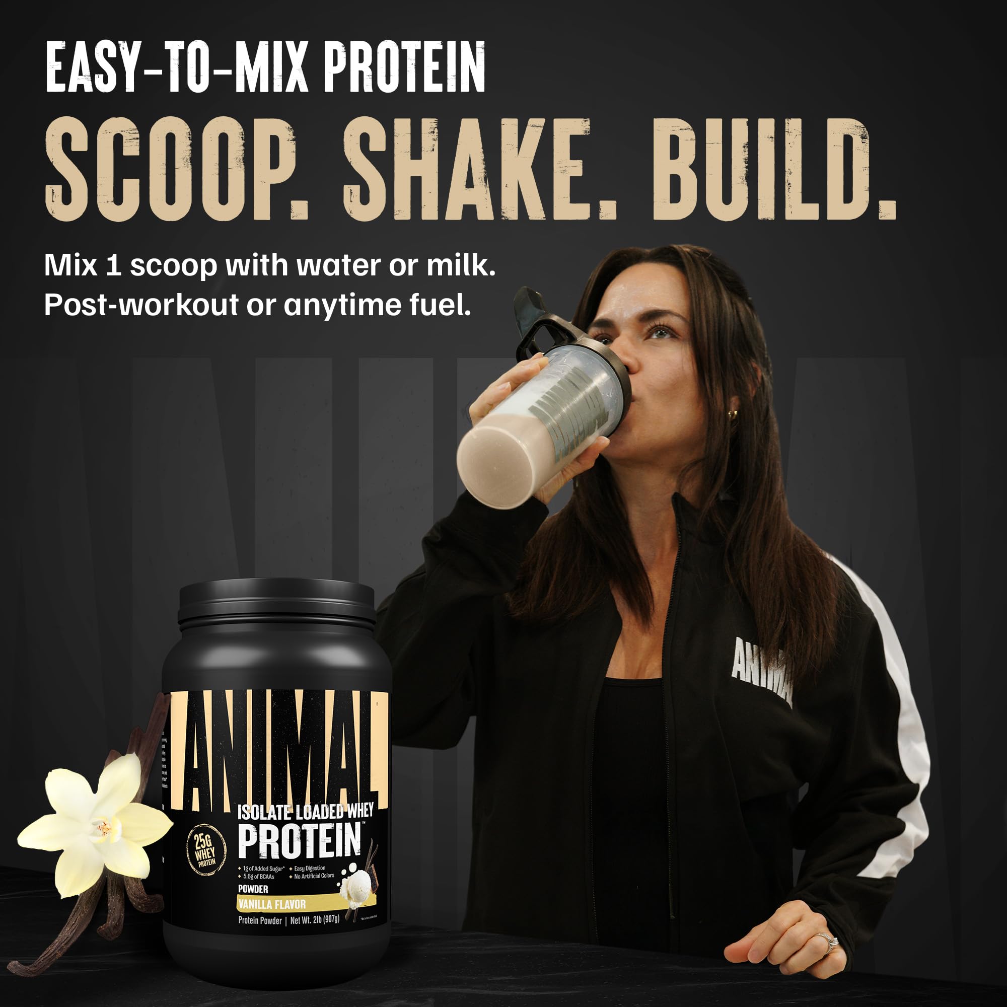 Animal Whey Isolate powder being stirred in a glass for a smooth shake