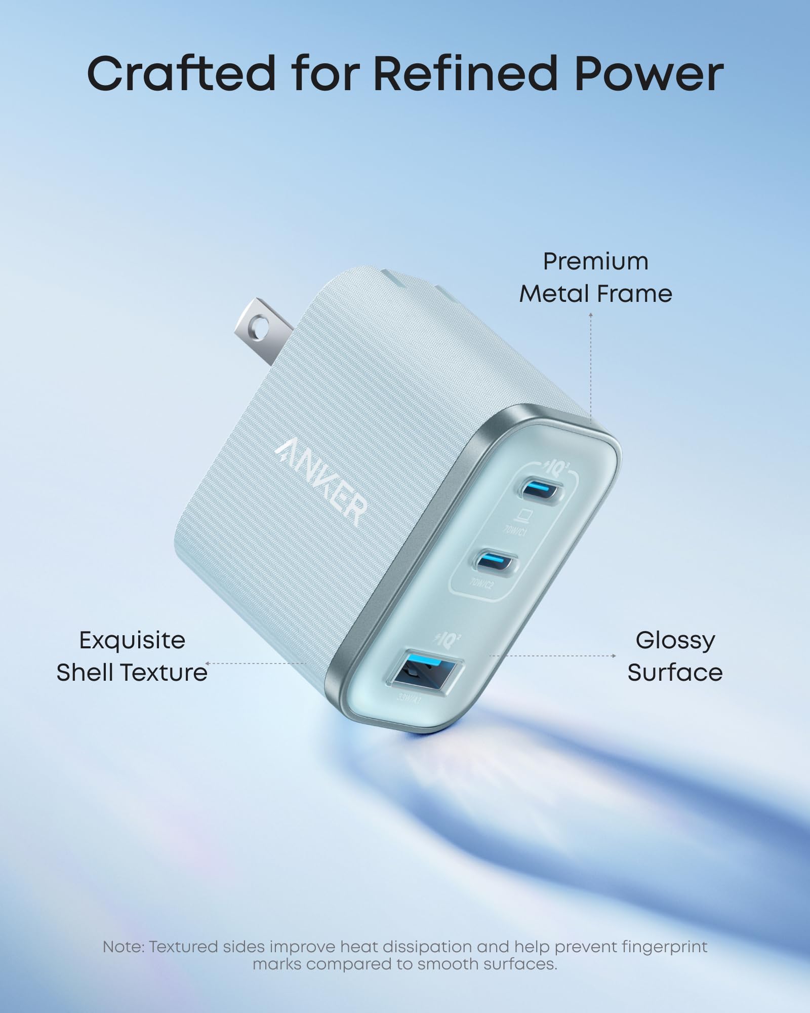 Anker Nano Charger 70W, elegant blue finish, premium metal frame complements workspace.