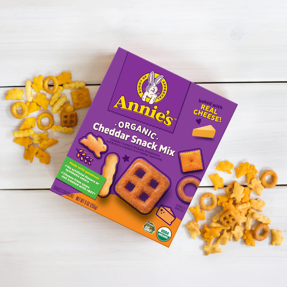 Annie's Cheddar Snack Mix packaging highlights organic and non-GMO goodness.