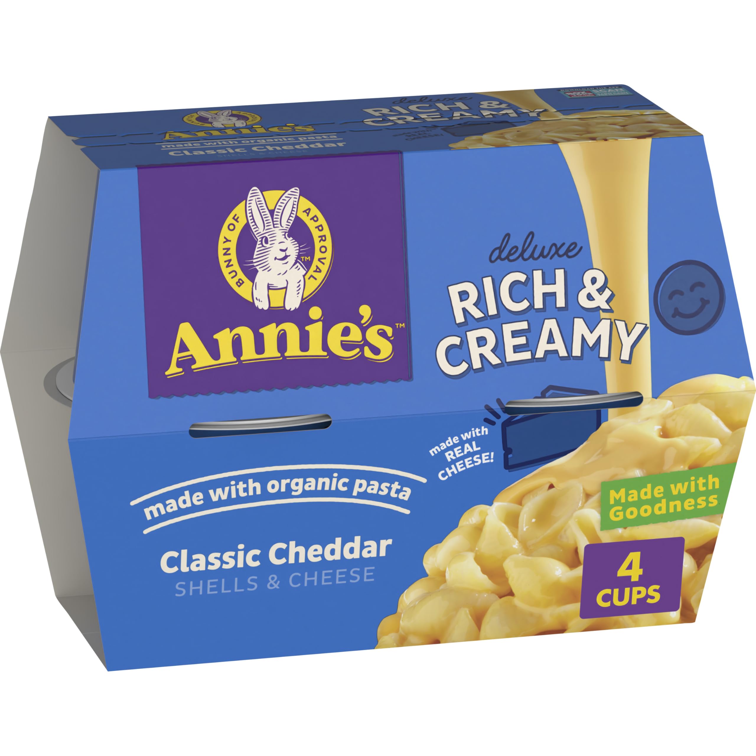 Annie's Classic Cheddar Deluxe mac and cheese cups packaging highlights organic pasta for quick family meals.