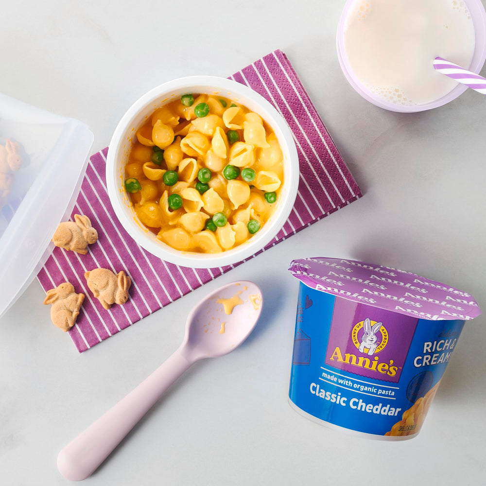 Annie's organic pasta shells close-up showing wholesome texture for a comforting bite.