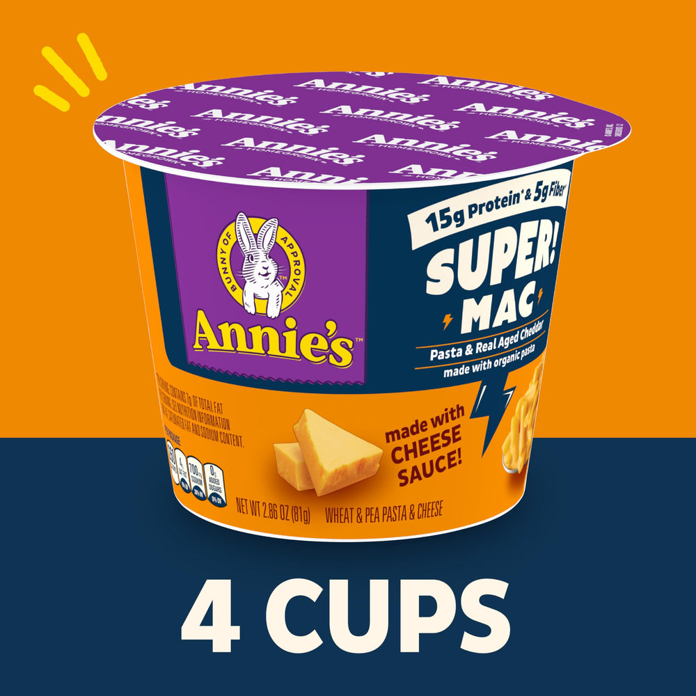 Annie's Super! Mac cheddar sauce packet in cup, ideal for fast weeknight meals.