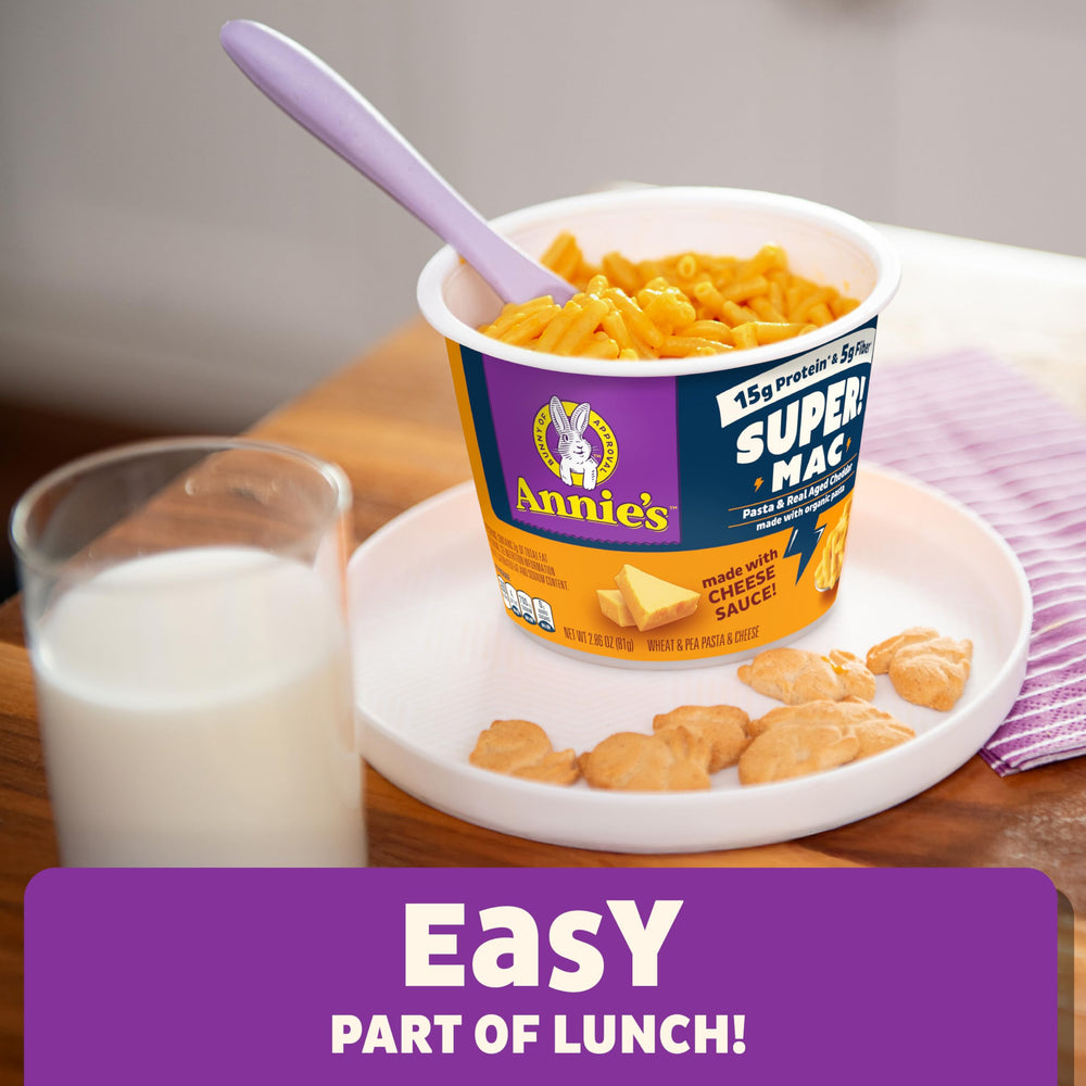 Four Annie's Super! Mac microwave cups in a 4-pack, pantry-friendly.