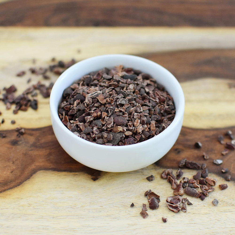 Anthony's Organic Cacao Nibs in a bowl ready for smoothie or topping.