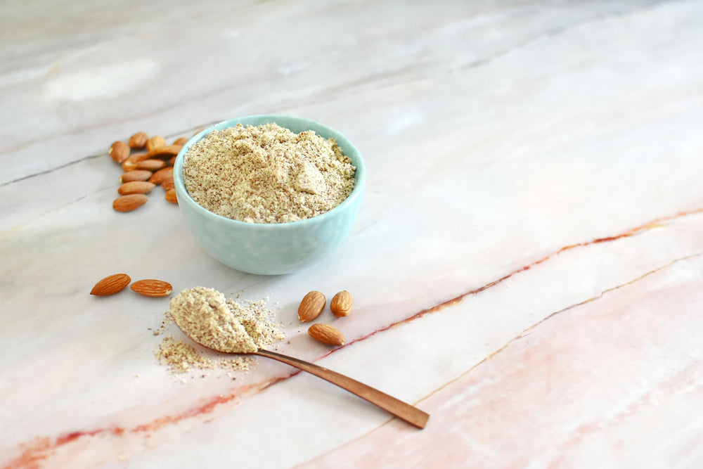 Anthonys Almond Meal Flour being poured into a bowl for baking