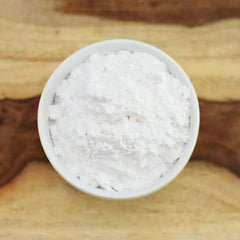 Close-up texture of Anthony's Arrowroot flour powder, fine and silky.