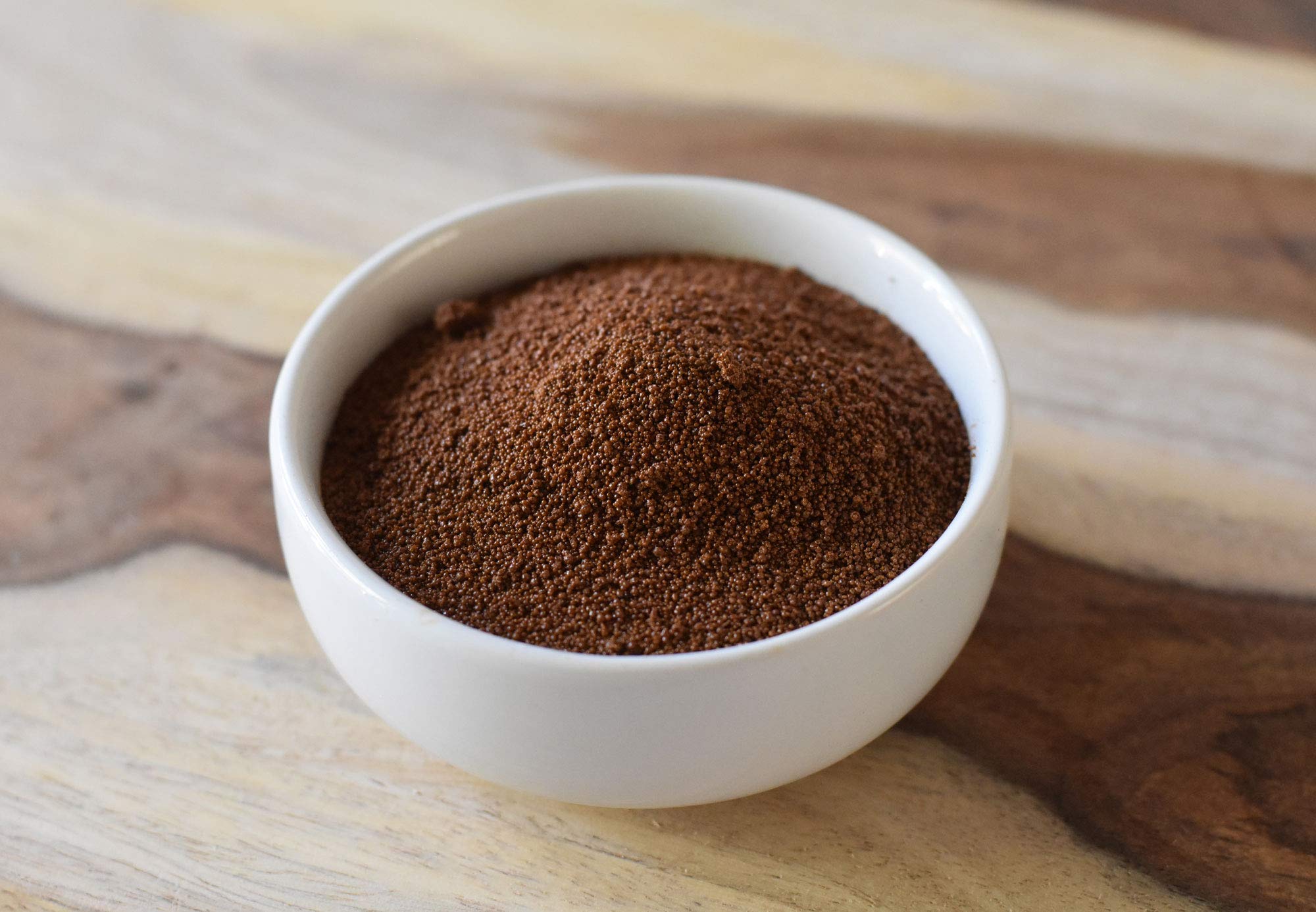 Anthony's chicory powder stirred into coffee; offers flavorful caffeine-free option.