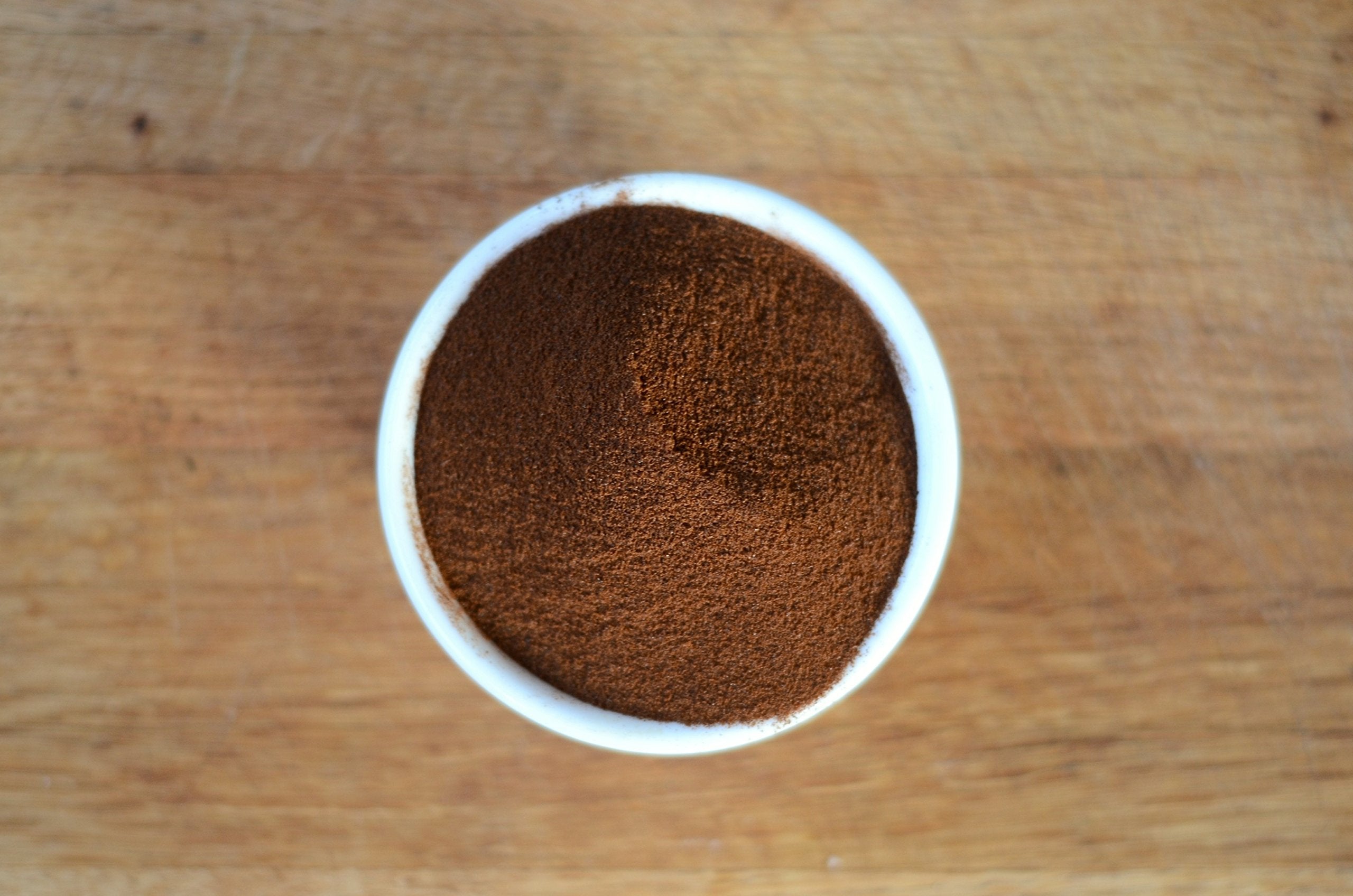 Steaming cup of Anthony's Organic Instant Coffee highlights aroma and plant-based energy