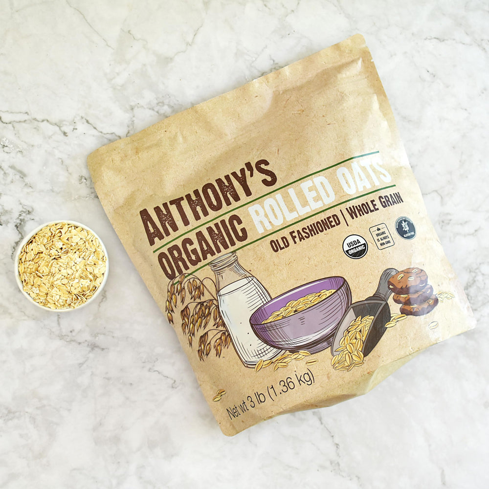 Anthony's oats on the counter with recipe ideas for pancakes and granola