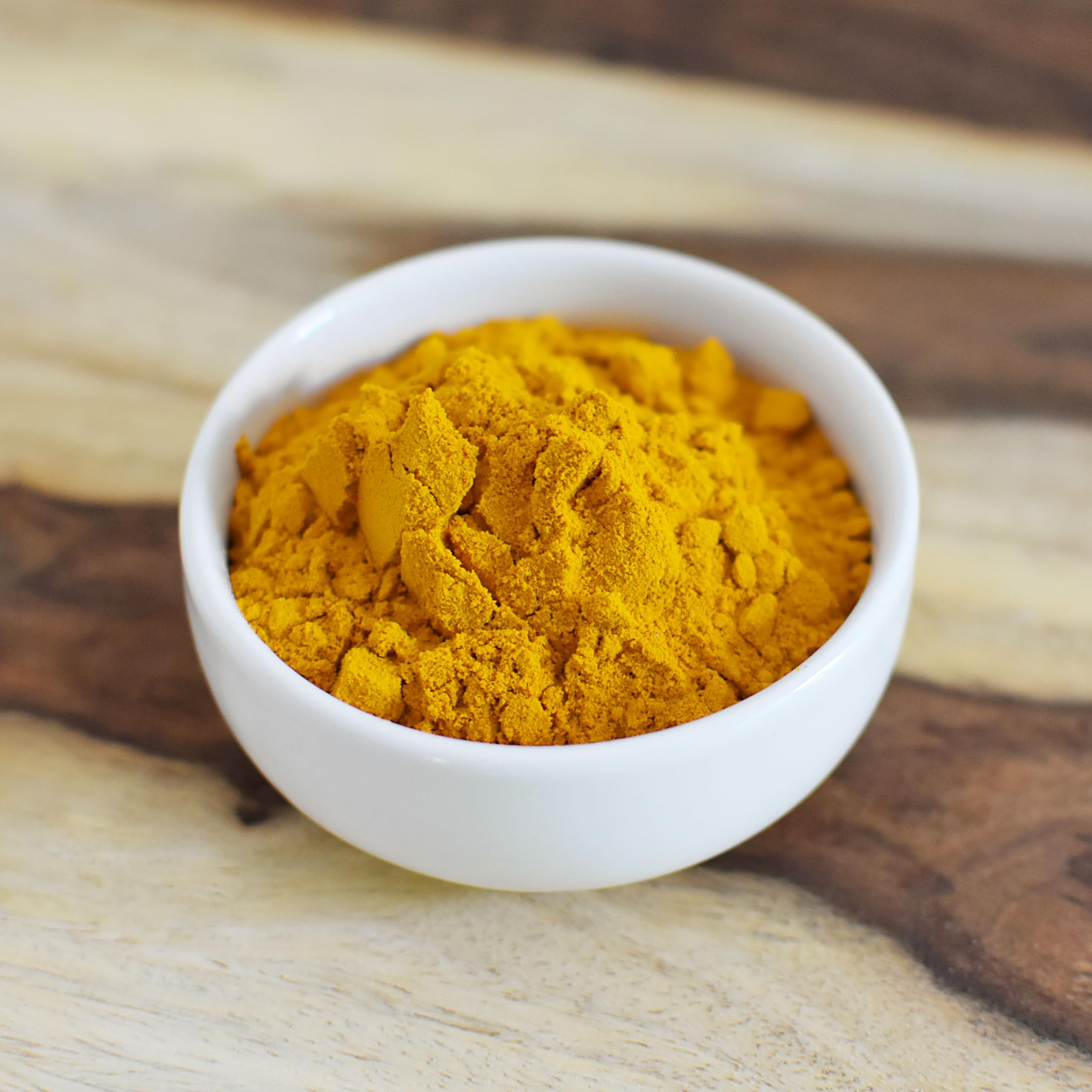 Anthony's Organic Turmeric Powder in a smoothie illustrates versatile use.
