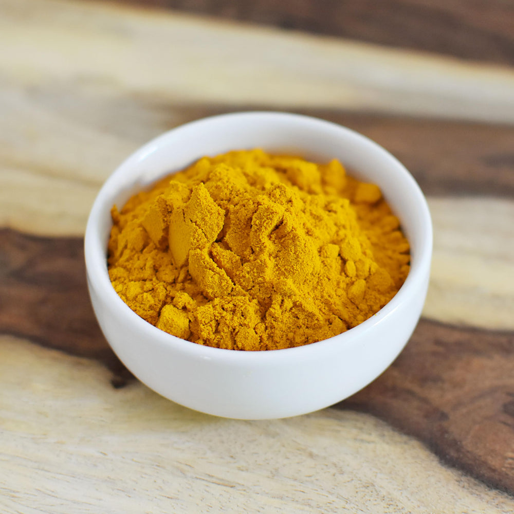 Anthony's Organic Turmeric Powder in a smoothie illustrates versatile use.