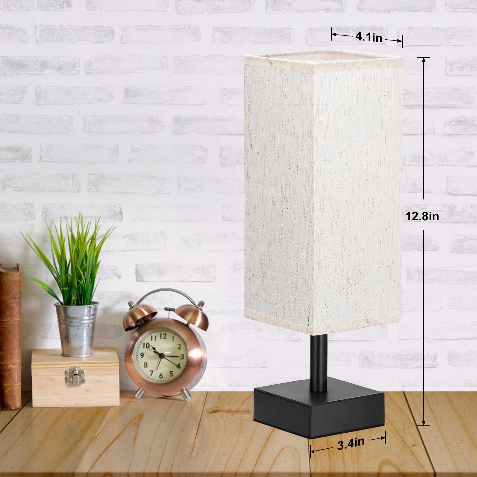 Aooshine bedside lamp showing off its square fabric shade and black base.