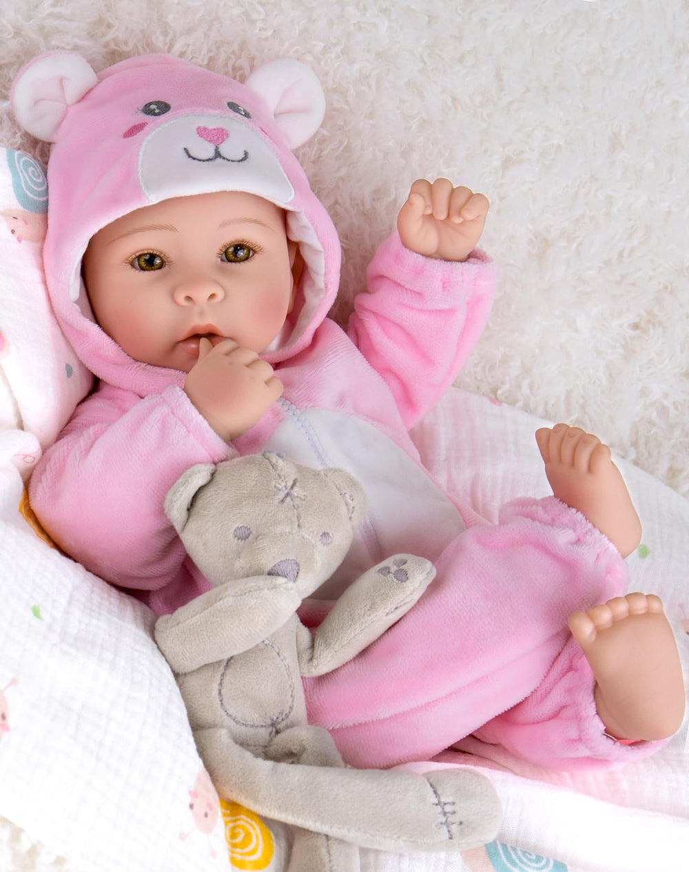 Aori Baby Doll 17-inch lifelike features encourage nurturing pretend play.