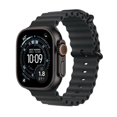 Apple Watch Ultra 3 titanium case shown in rugged outdoor use, emphasizing durability.