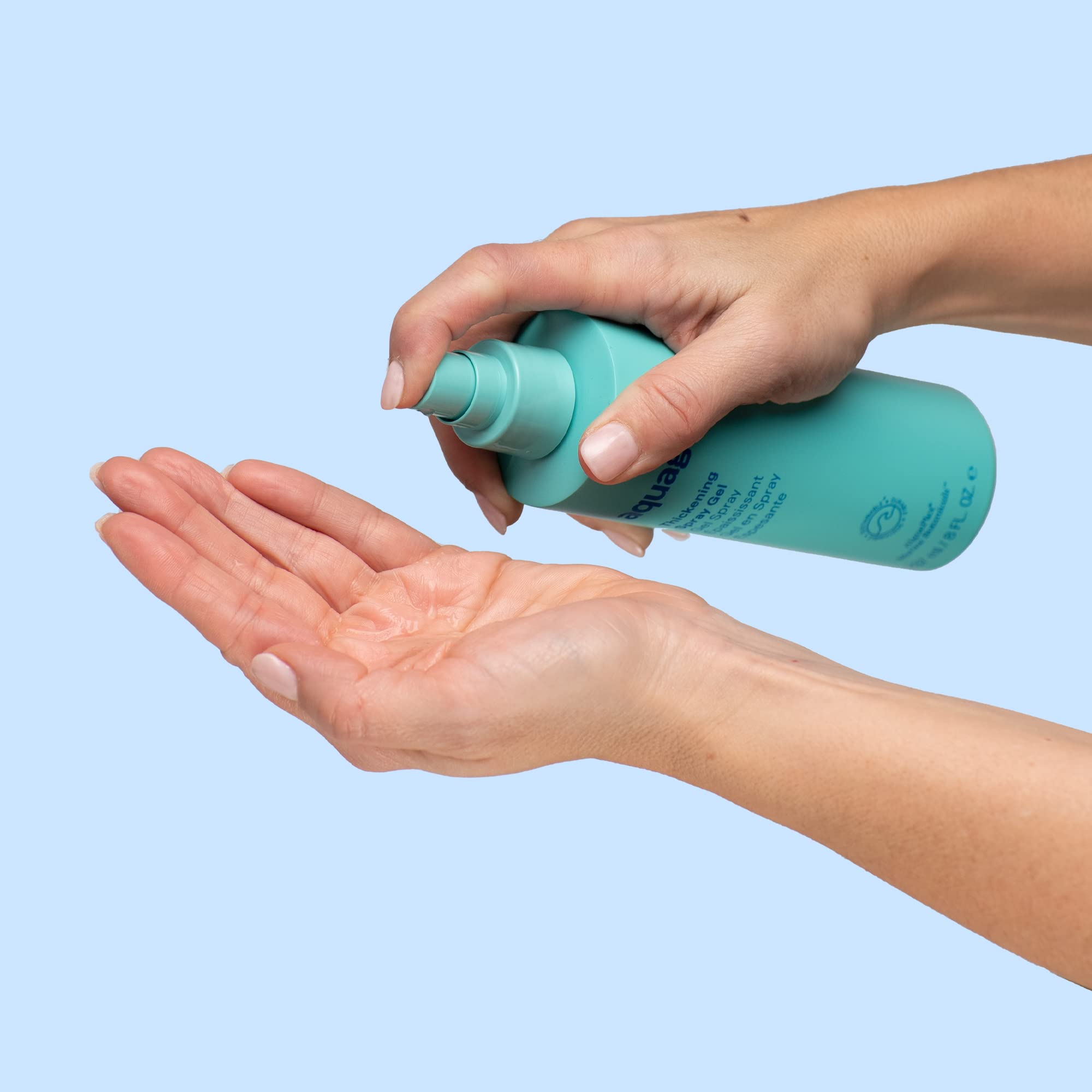 Aquage Thickening Spray Gel applying on hair to add body