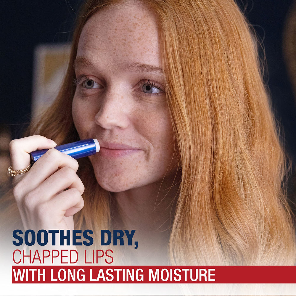 Applying Aquaphor Lip Repair shows smooth glide and moisture on lips.