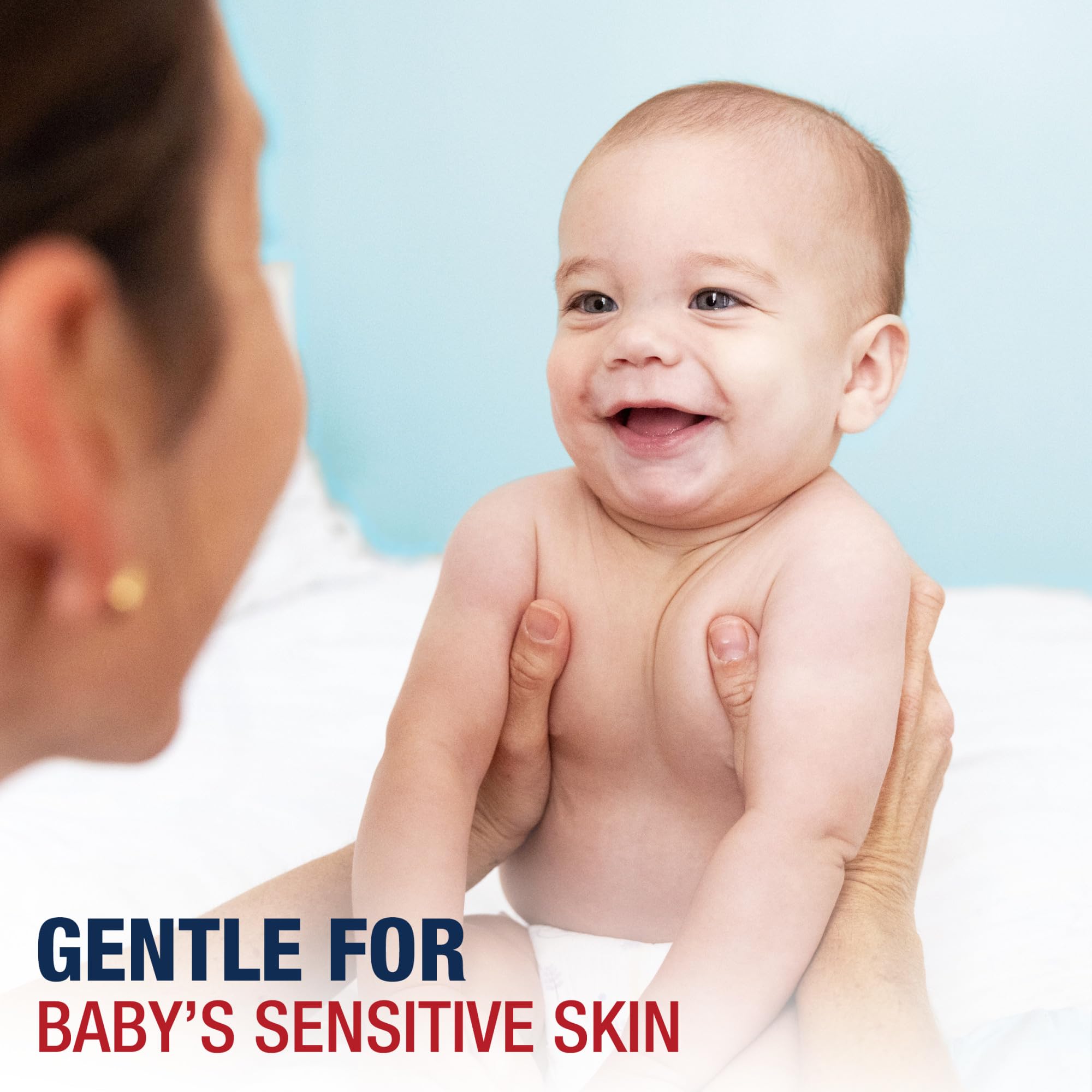 Aquaphor Baby Diaper Rash Cream being applied on a soft area