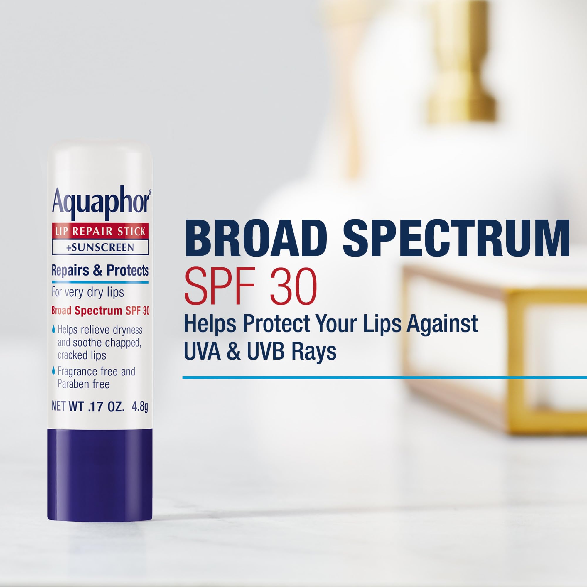 Aquaphor Lip Repair Stick in use with smooth glide on lips for moisture