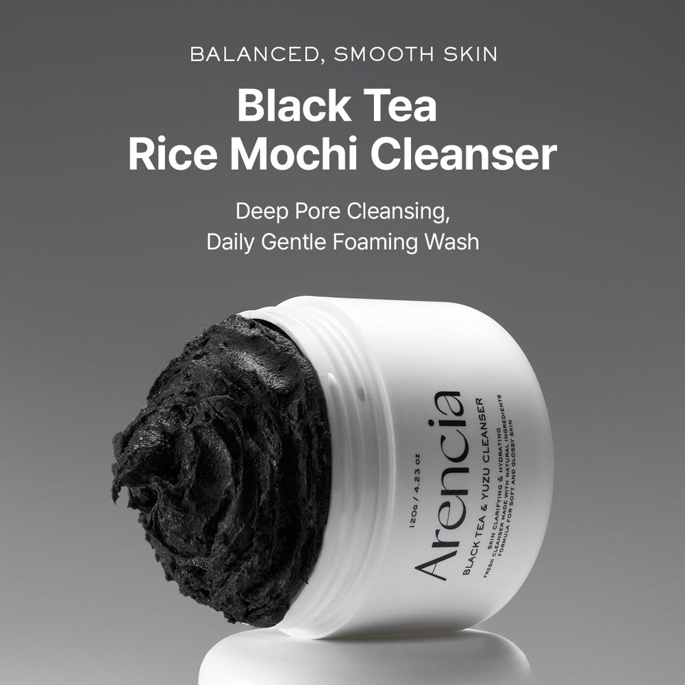ARENCIA Cleanser texture close-up reveals gentle exfoliating grains for balanced cleansing.