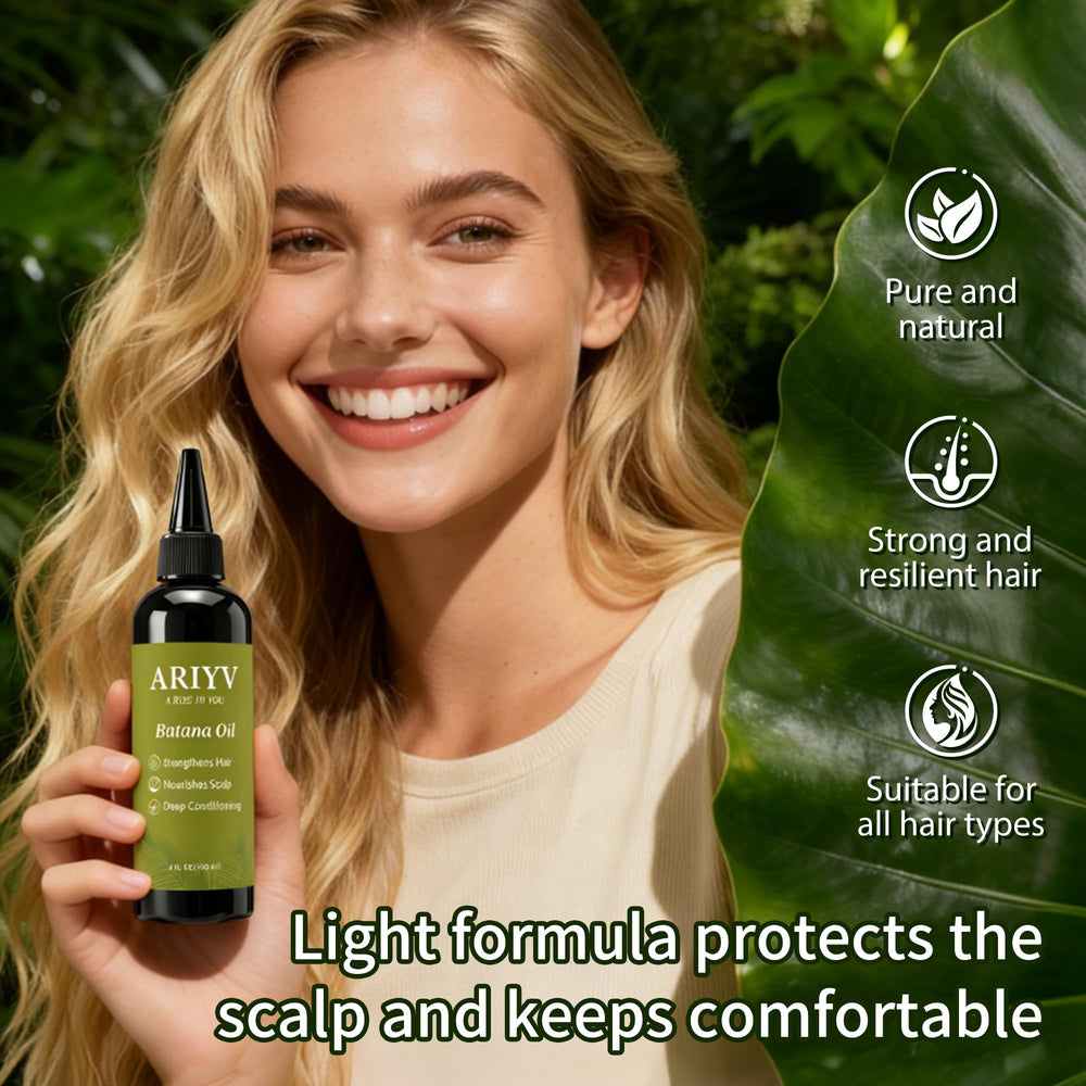 A bottle of Ariyv Batana Oil beside dry hair for moisture.