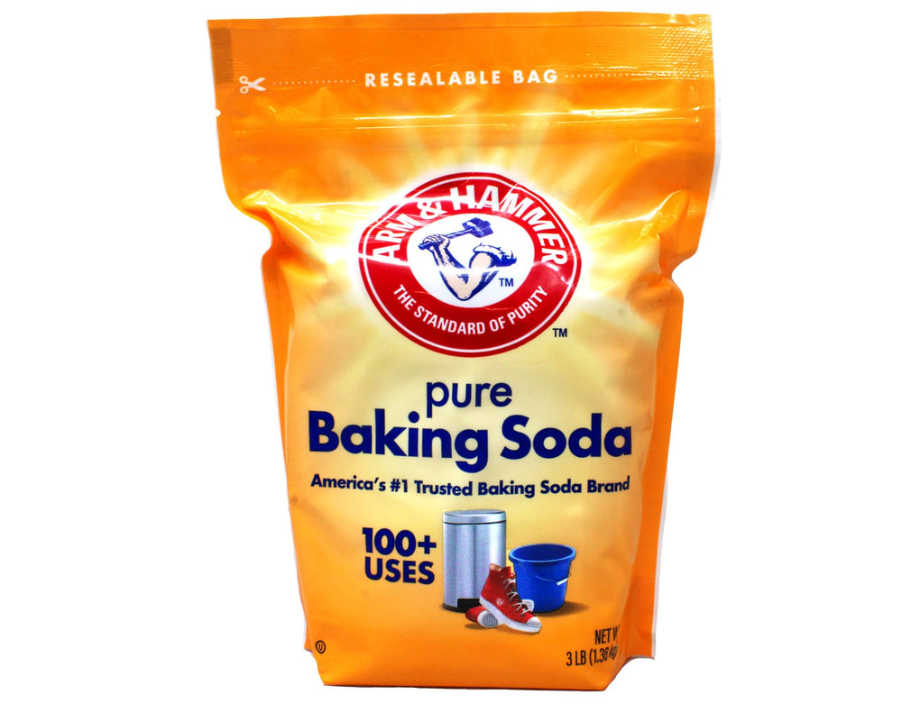 Arm & Hammer baking soda 3lb bag on counter for versatile kitchen baking.