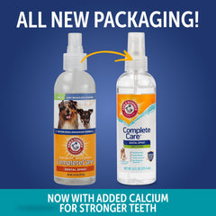 Arm & Hammer mint-flavored spray applied to dog's teeth for fresh breath.