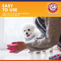 Arm & Hammer dog dental water additive dog drinking water scene illustrates effortless care.