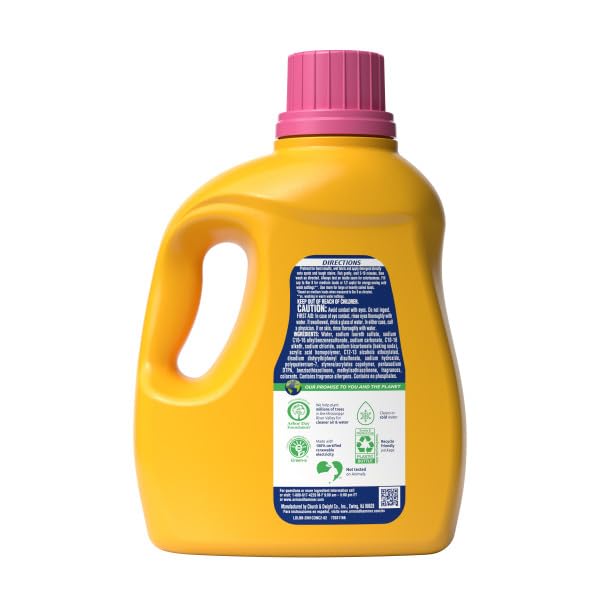 ARM & HAMMER Plus a Touch of Softener bottle pour showing quick dispensing