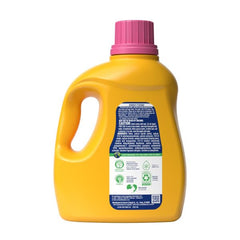 ARM & HAMMER Plus a Touch of Softener bottle pour showing quick dispensing