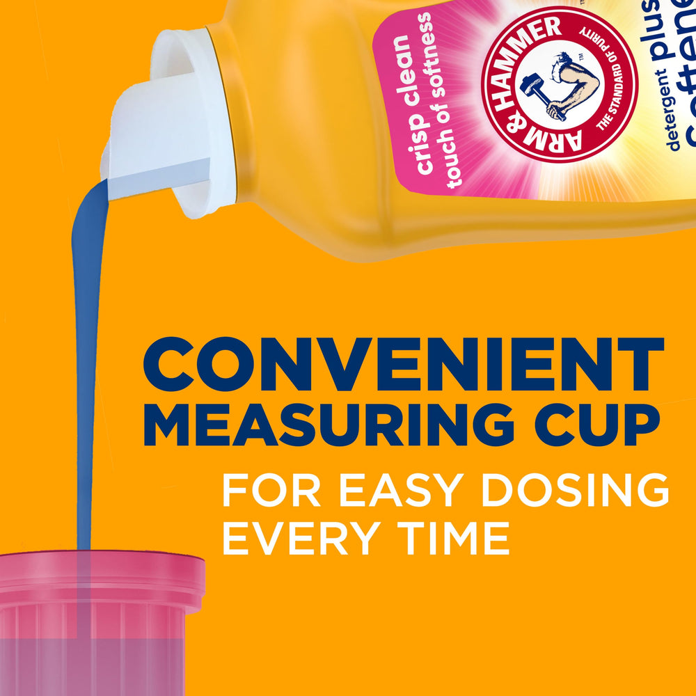 ARM & HAMMER Plus a Touch of Softener bottle beside fresh laundry