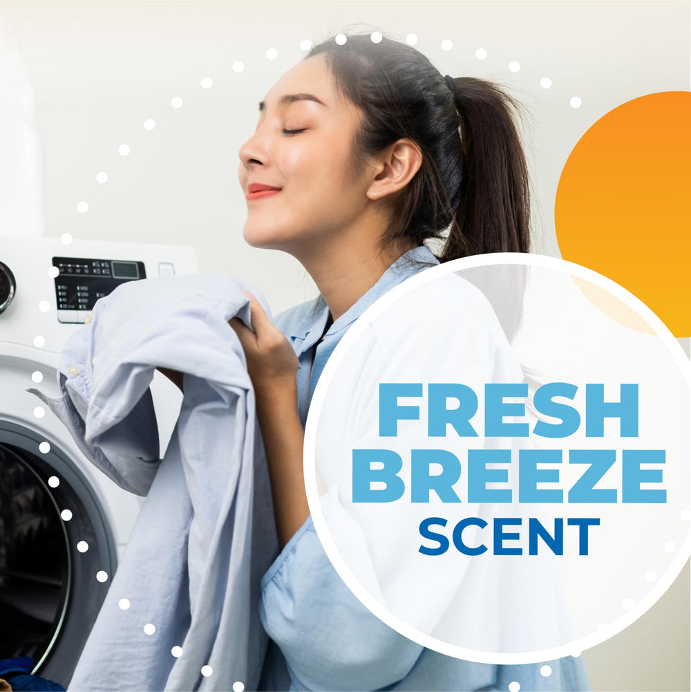 Arm & Hammer Power Sheets Fresh Breeze in washing machine with clothes.