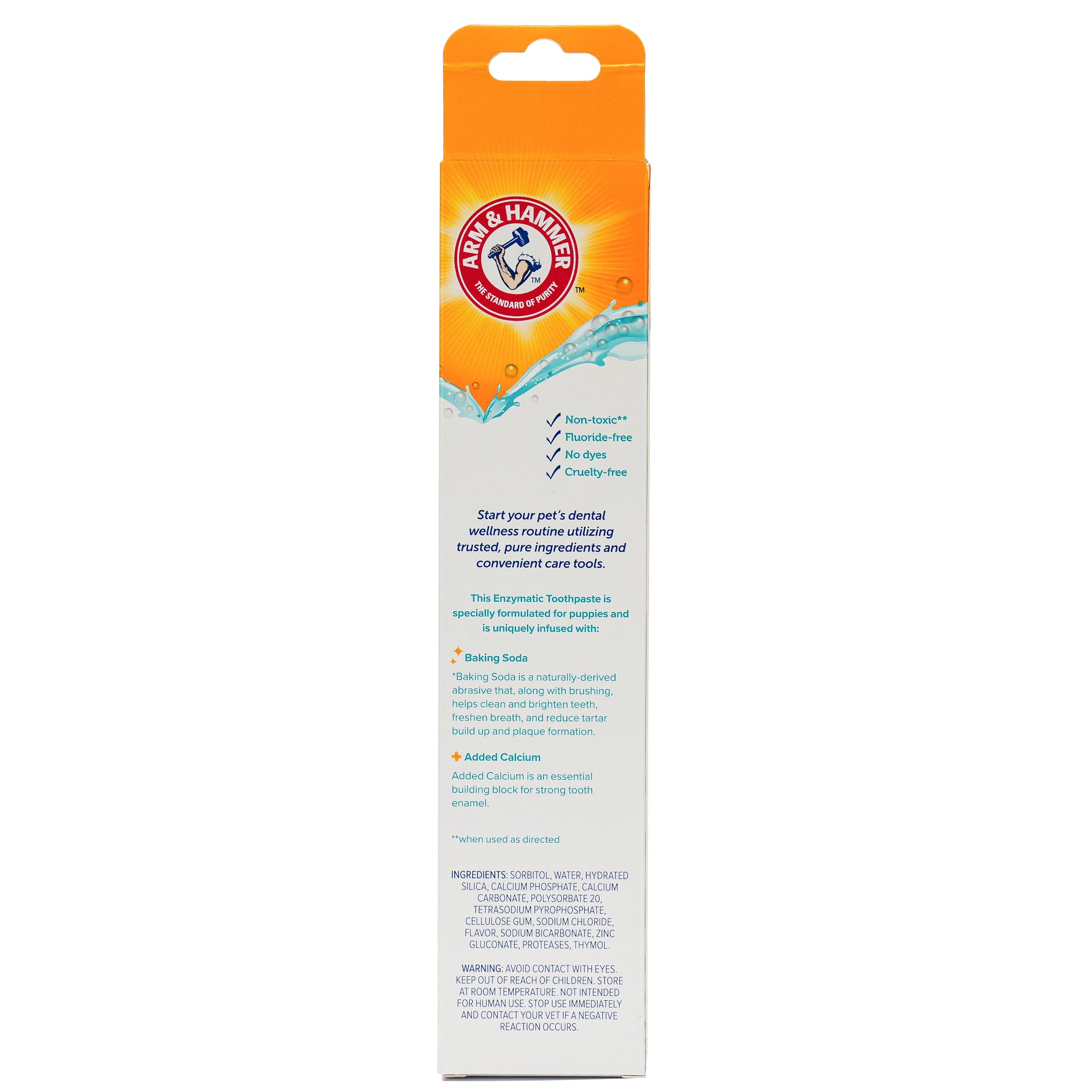 Arm & Hammer puppy toothpaste being applied with a finger brush for first-time users.