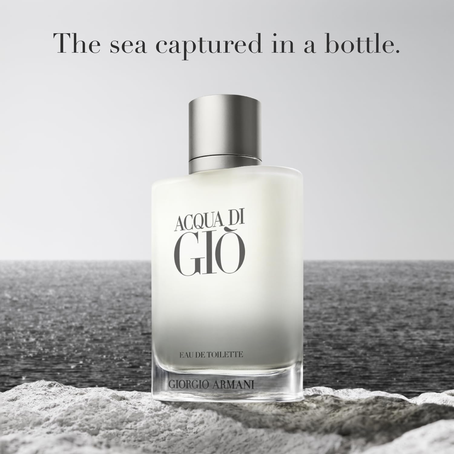 Spray application demonstrates even distribution of Acqua di Gio on skin.
