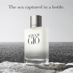 Spray application demonstrates even distribution of Acqua di Gio on skin.