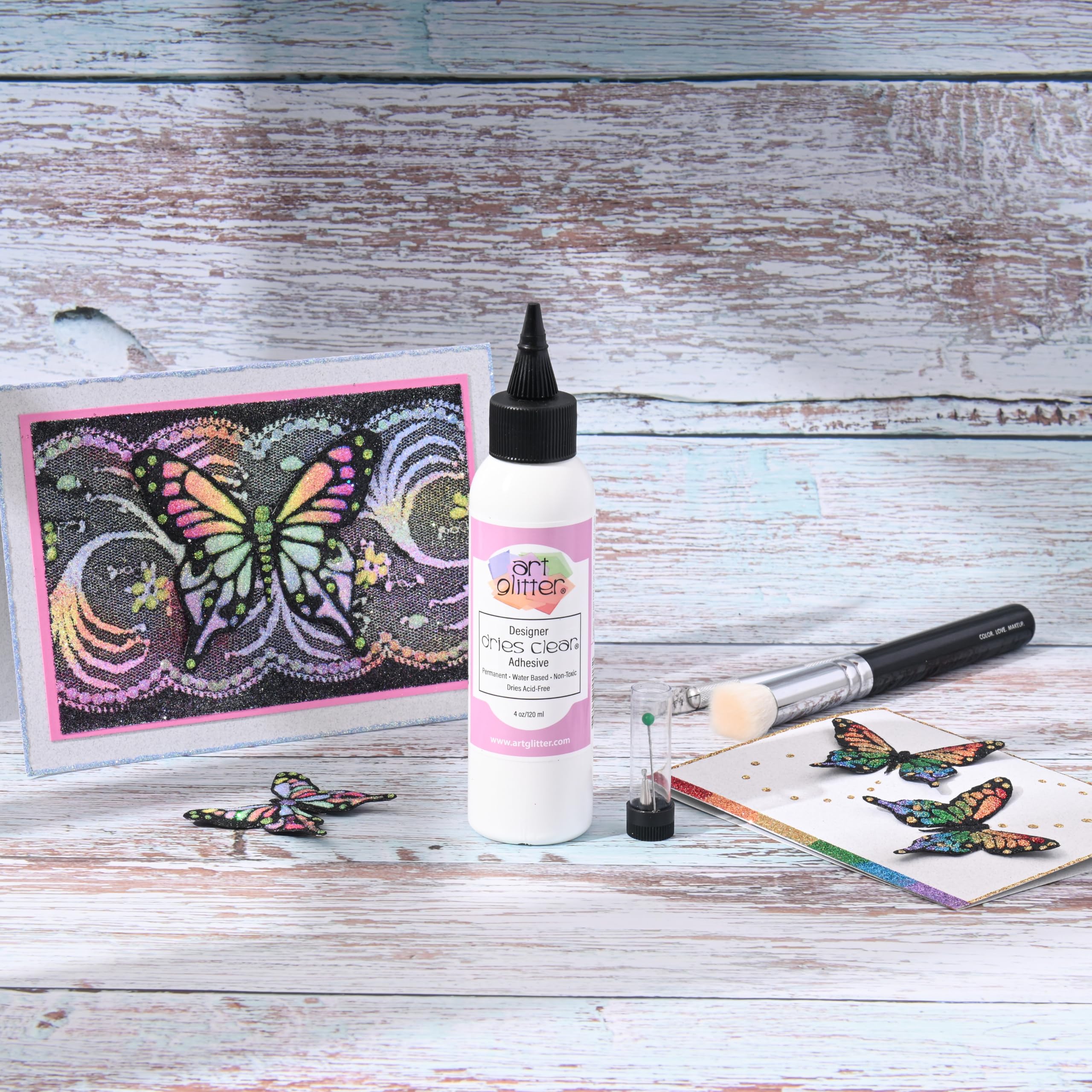 Art Glitter Glue bonds paper, acetate, wood, and more