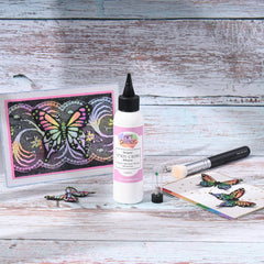 Art Glitter Glue bonds paper, acetate, wood, and more