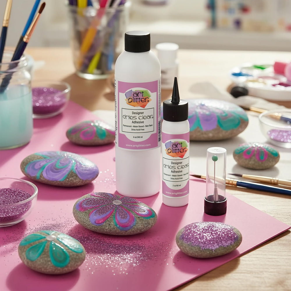 Art Glitter glue on paper enhances adhesion for paper craft projects.