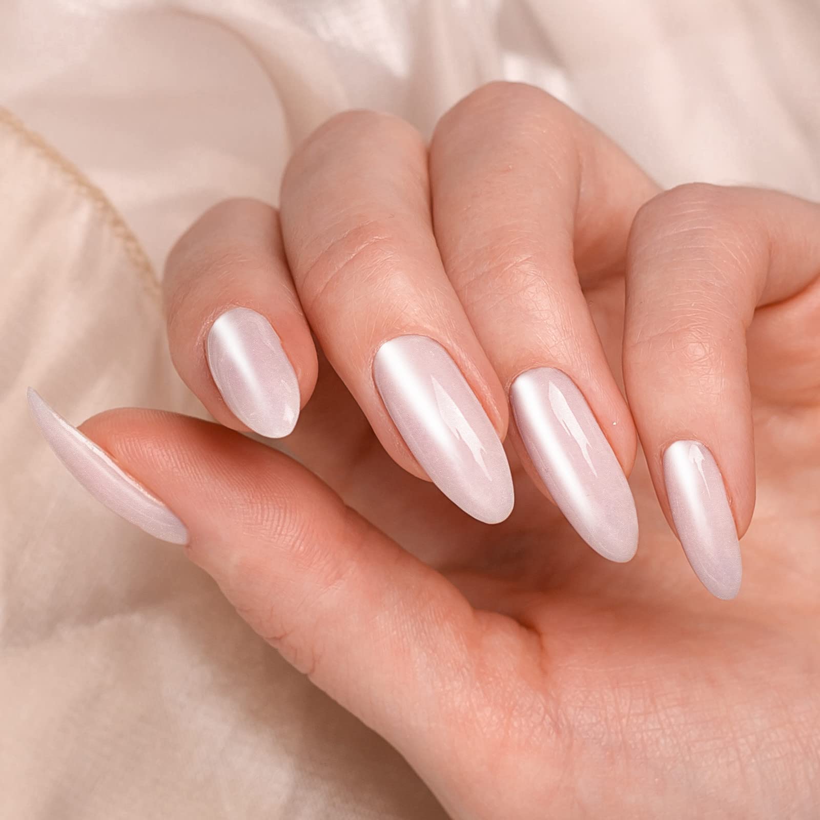 Artdone White Pearl Chrome over light polish demonstrates color shift