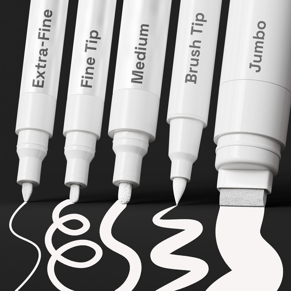ARTISTRO 5 white paint pen on rock for opaque, durable designs.