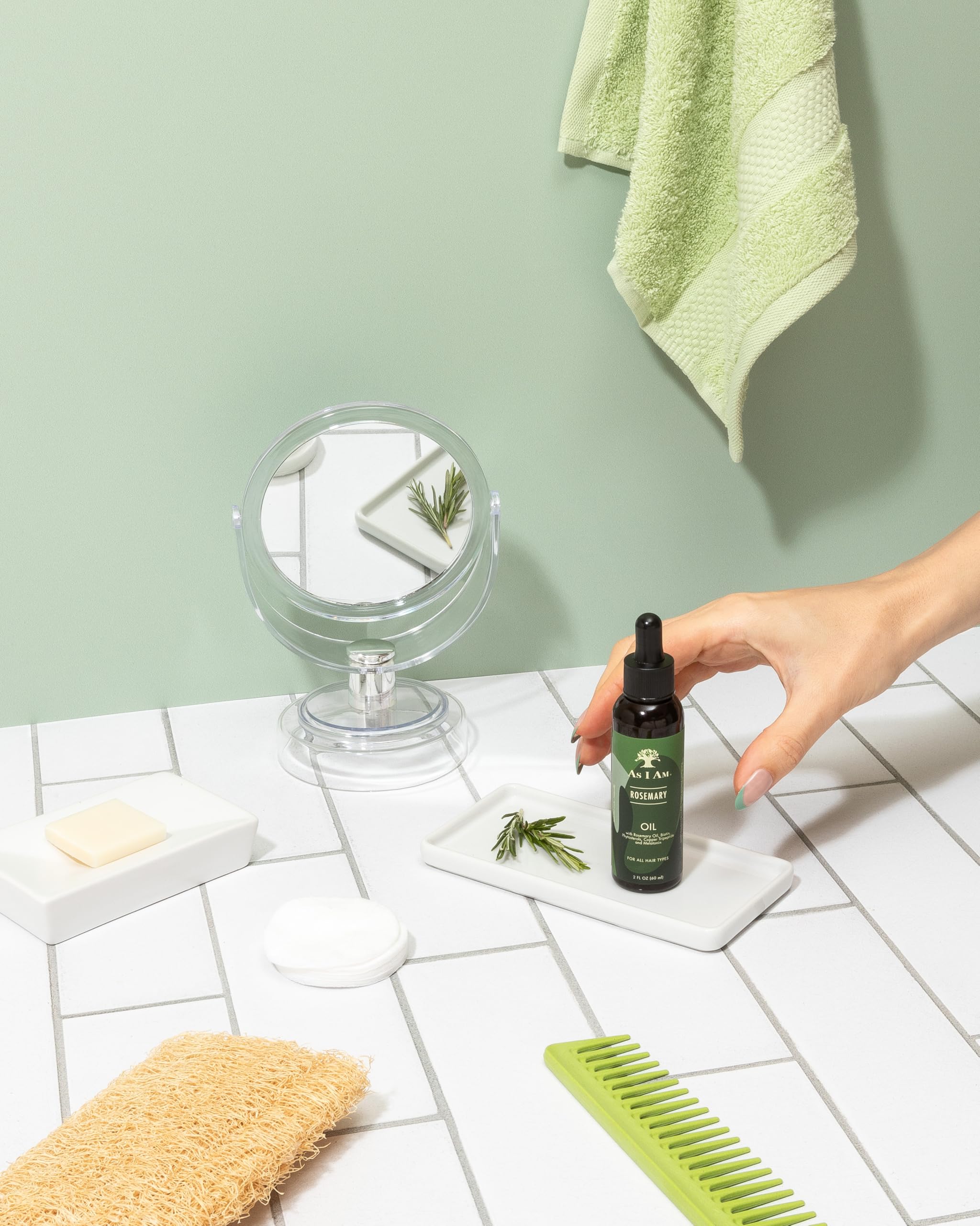As I Am Rosemary Oil packaging is compact for home use.