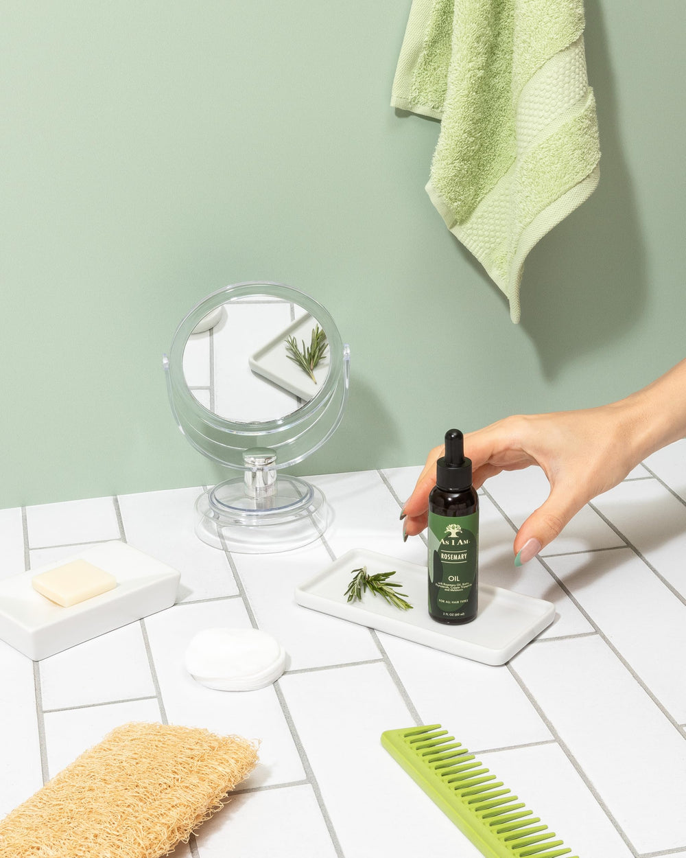 As I Am Rosemary Oil packaging is compact for home use.
