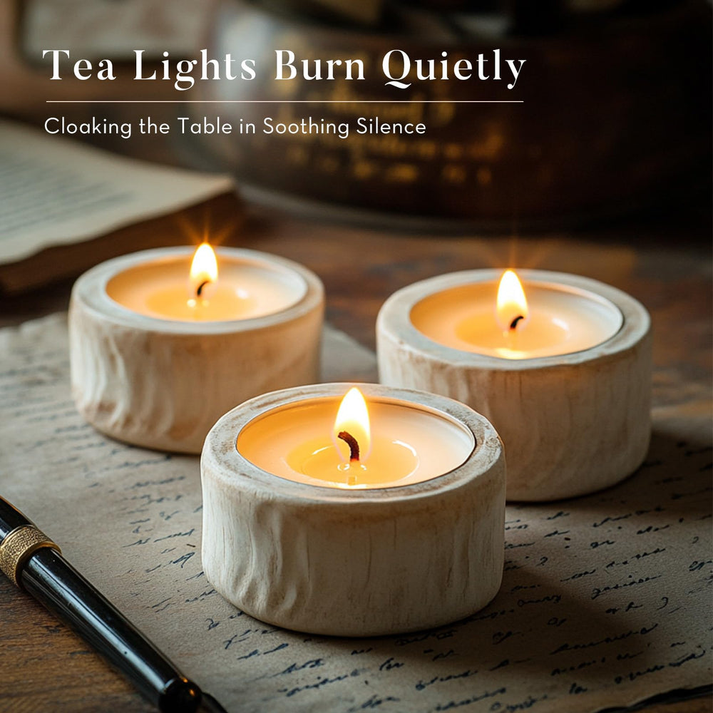 Ashlux tea lights close-up showcasing warm, steady glow for intimate ambiences.