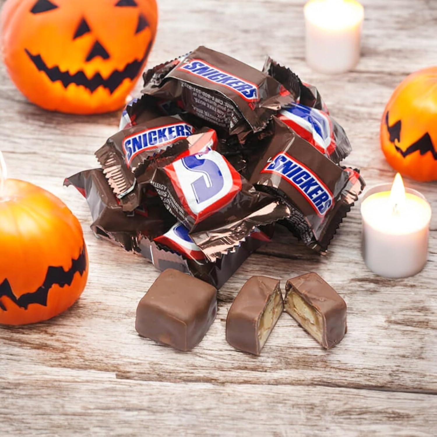 Assortit Snickers Minis in candy dishes for holidays and gatherings.